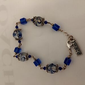 Blue Beaded Bracelet with Peace Charm‎